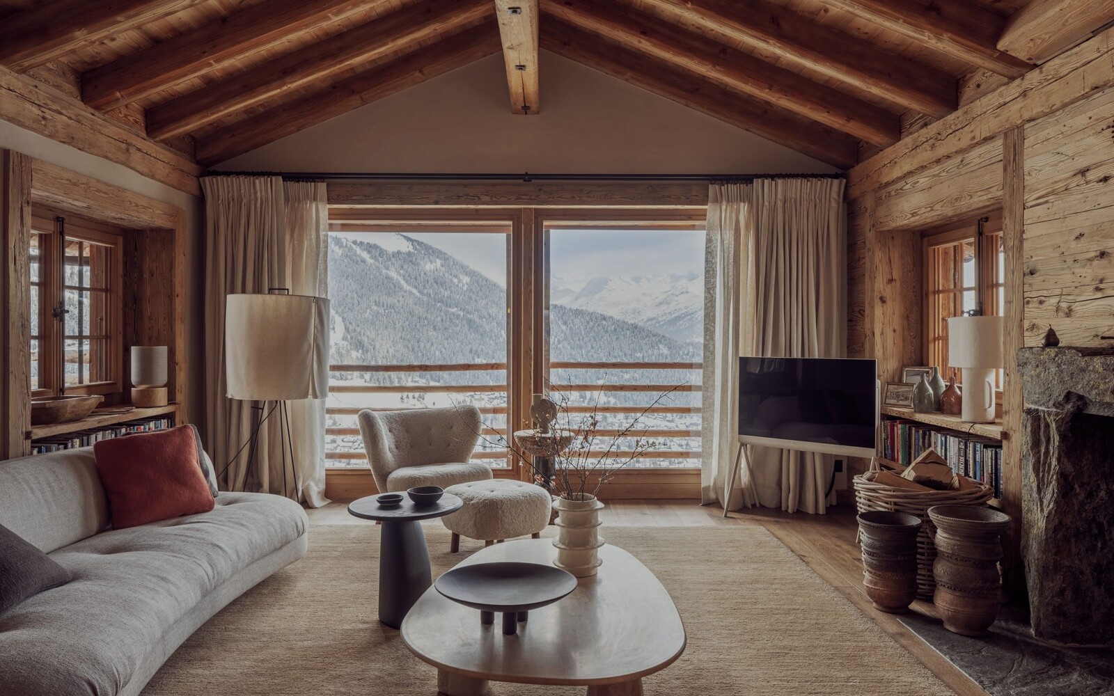 Chalet Vallon d’Arbi above Verbier with snow-covered peaks beyond.