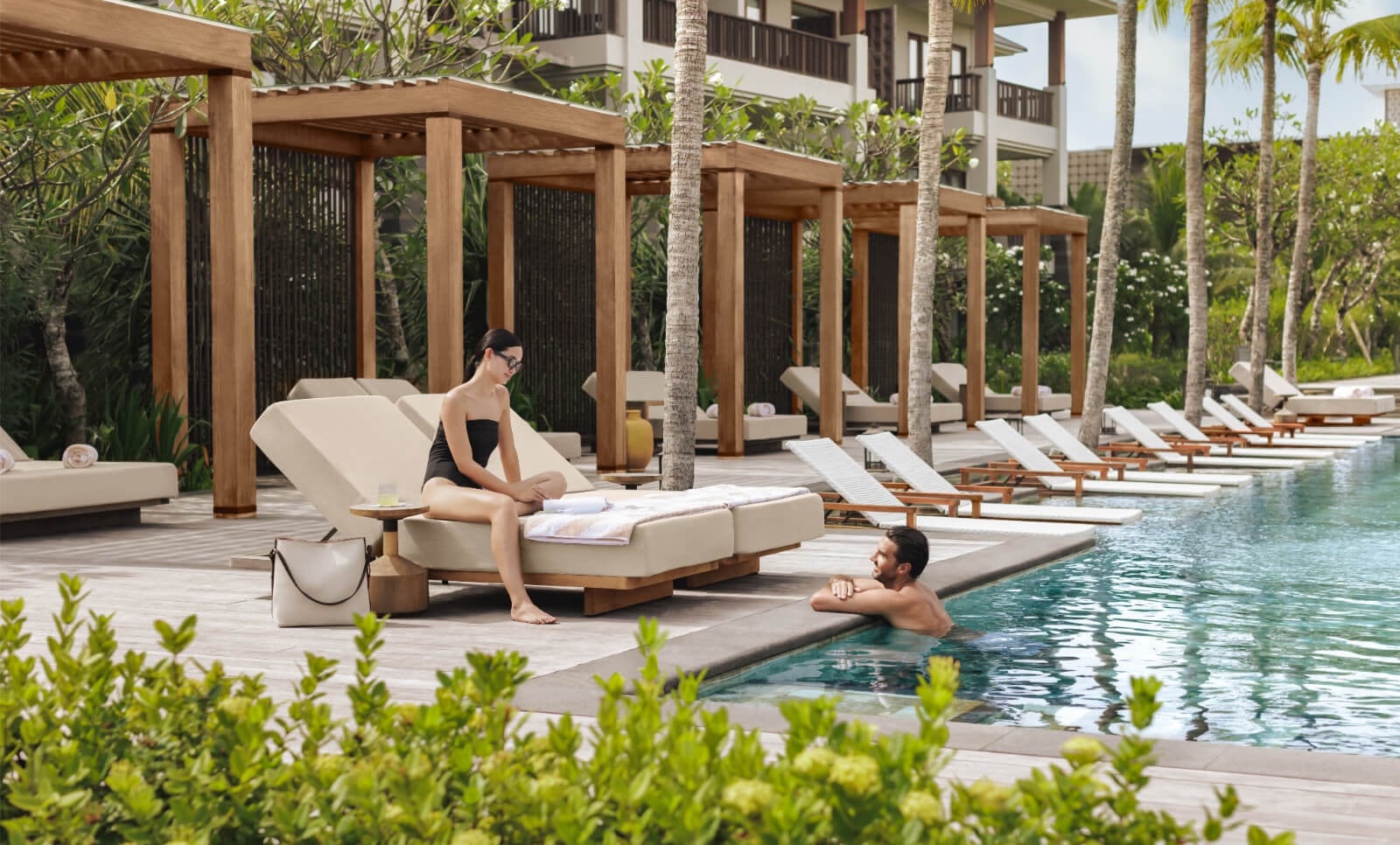 The main pool at Regent Bali Canggu overlooking the coast.
