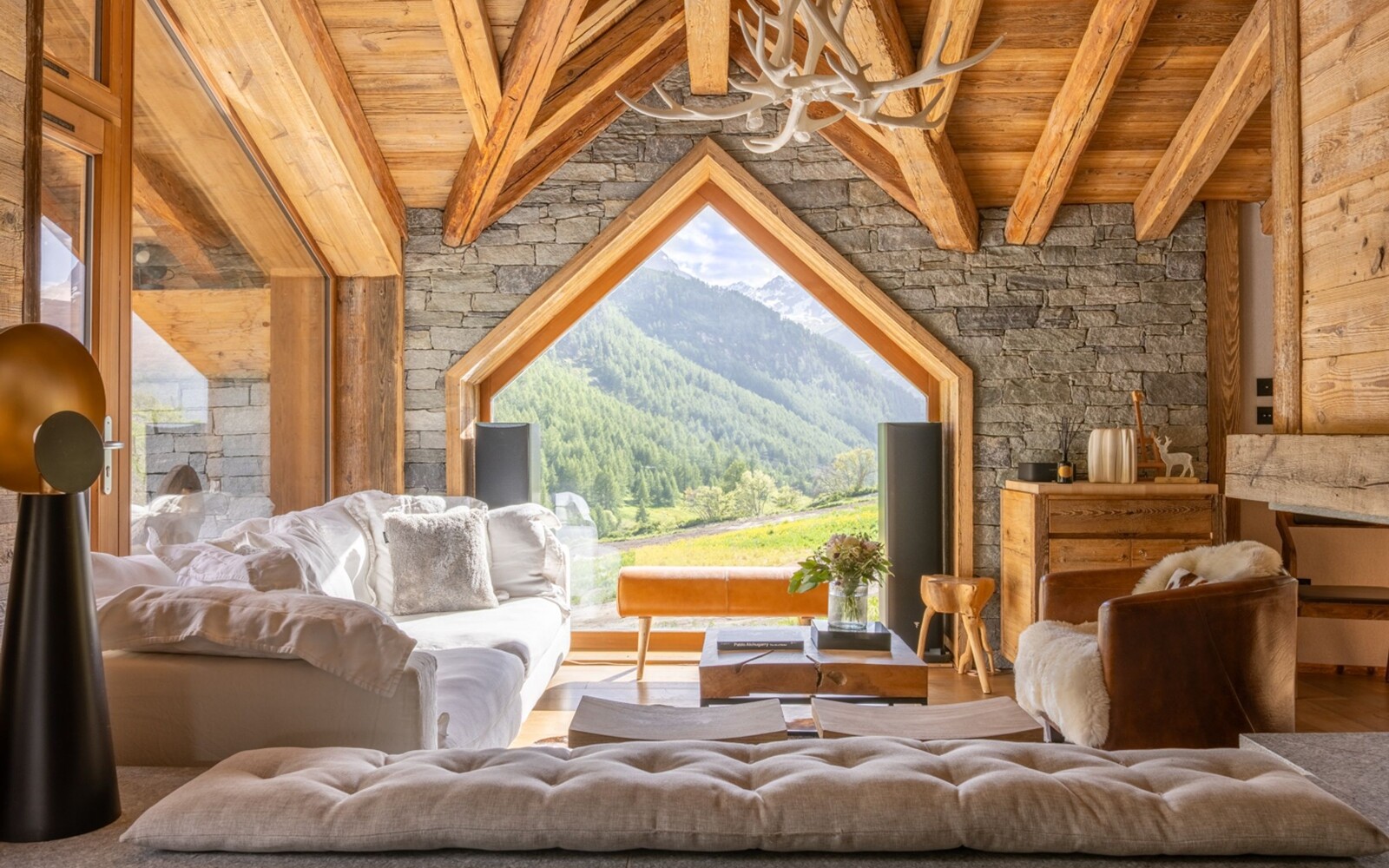 Chalet Oly in Le Fornet, Val d’Isère, surrounded by snowy mountain scenery.