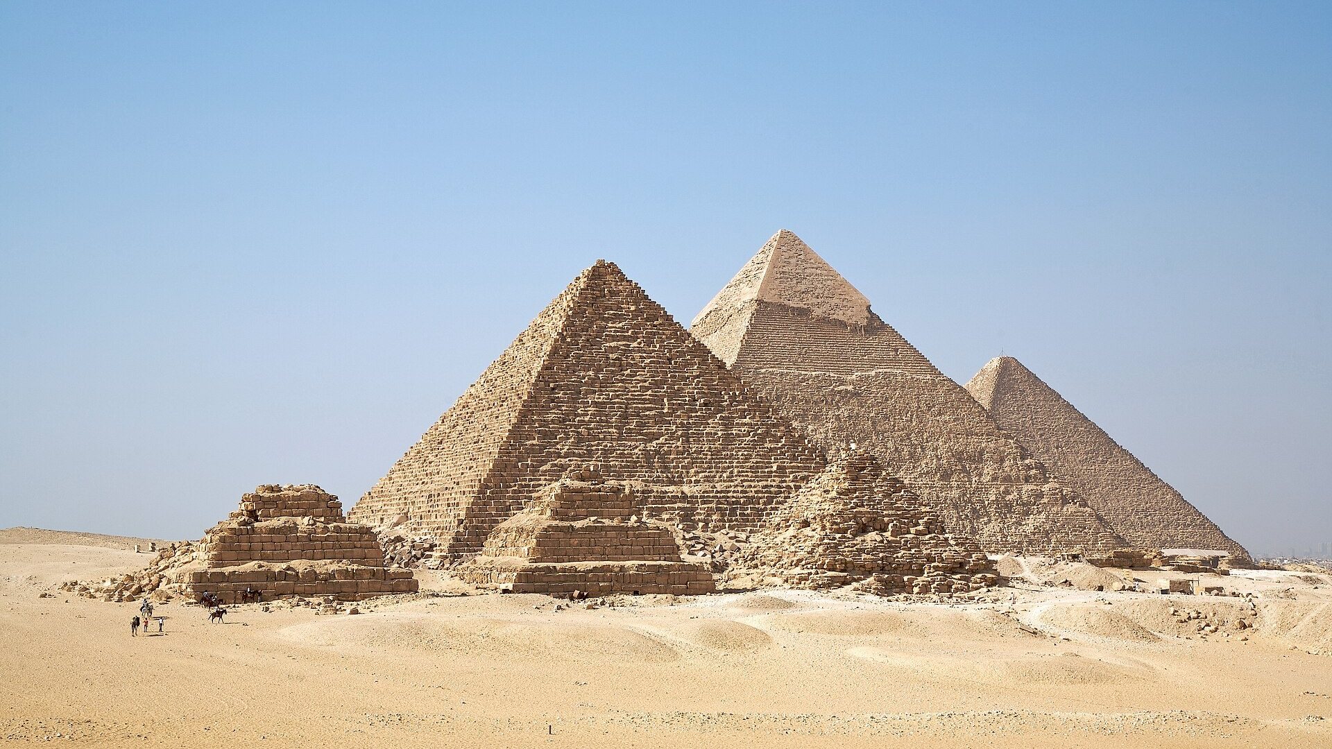 The Giza pyramids rising from the desert in clear morning light